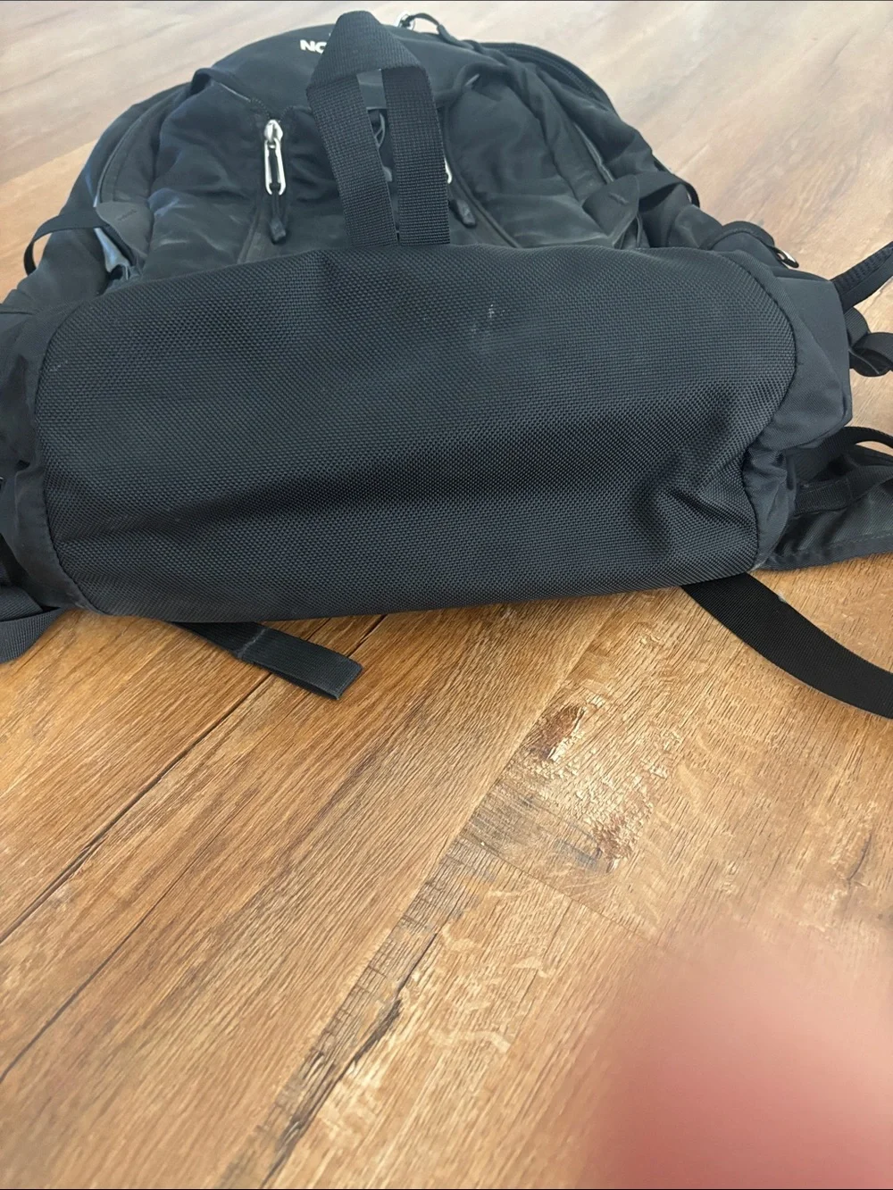 The North Face Surge Backpack in Black with Reflective Accents